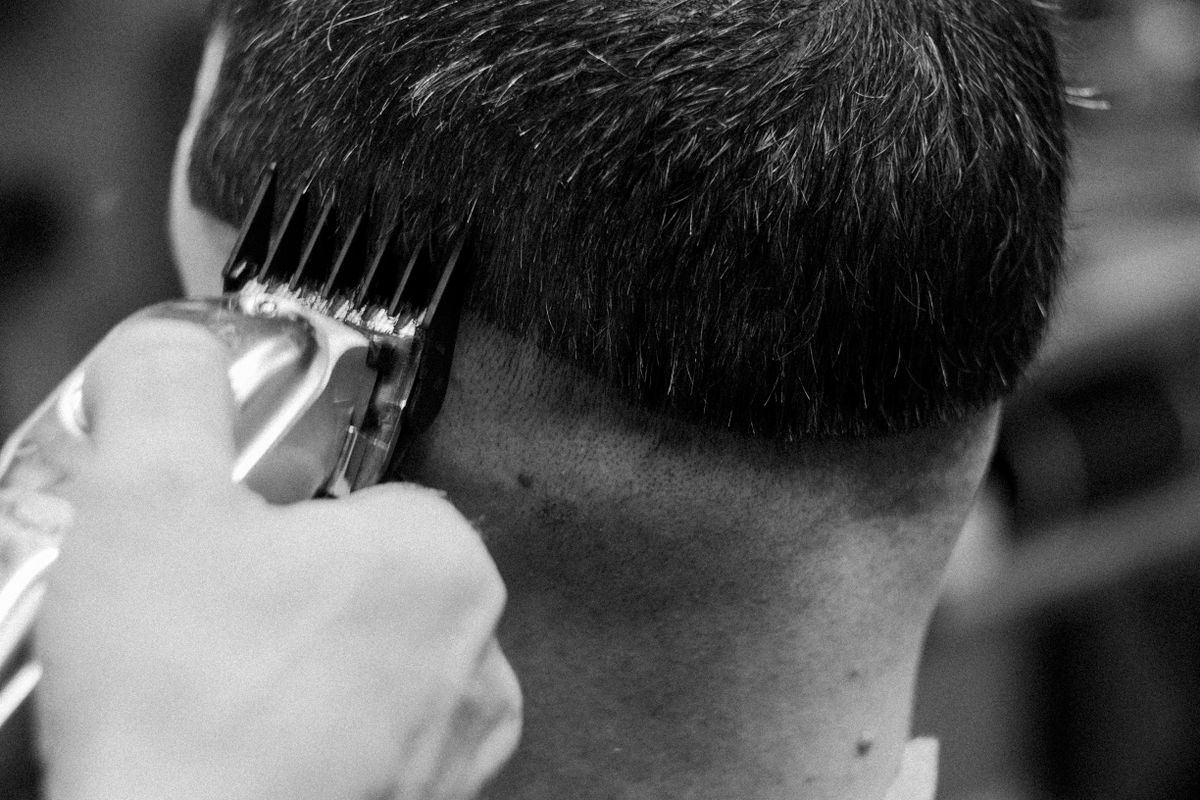 Classic taper photographed in black and white, client turned from the camera